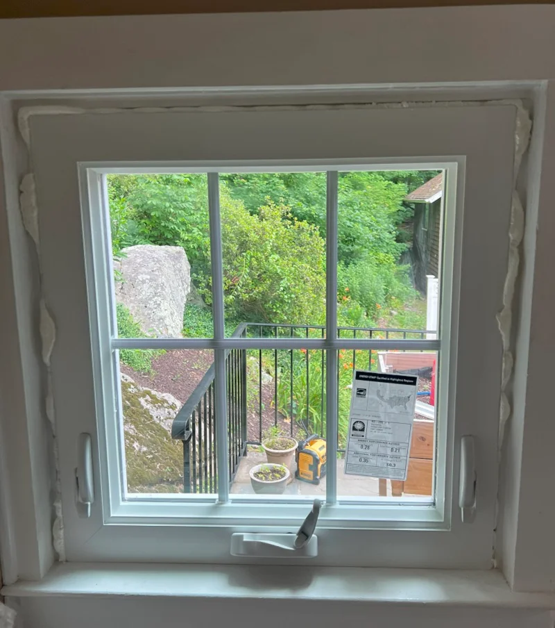 OSI spray foam used around window for insulation
